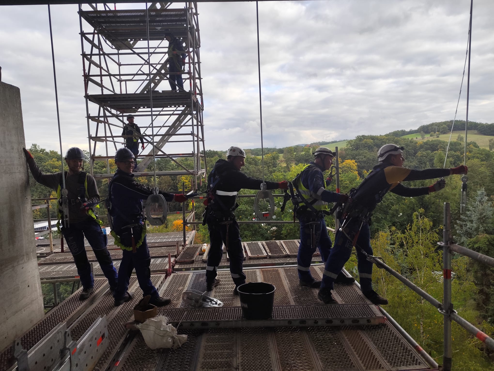 AXFOLD team working on industrial scaffolding